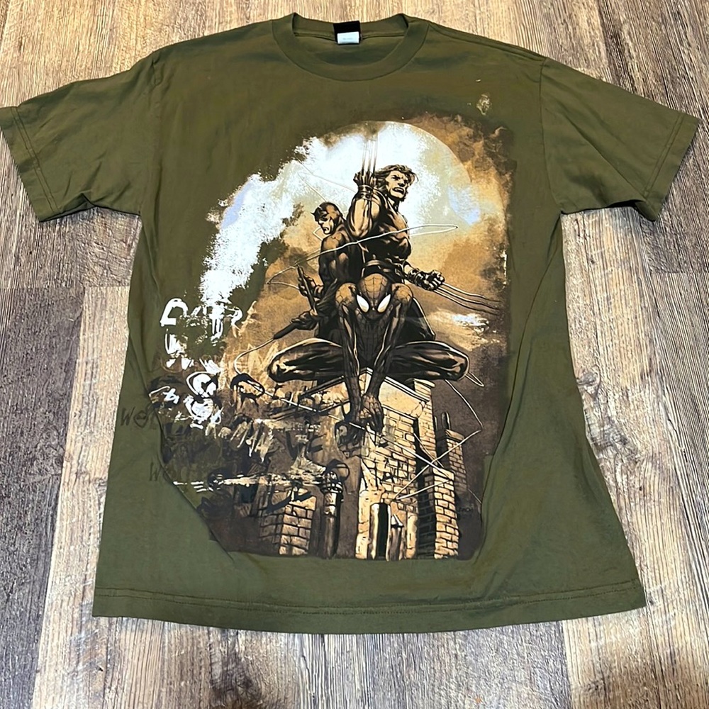 Marvel t-shirt, Spider-Man, daredevil, and wolverine. Barely worn, size medium